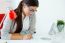 Young Businesswoman Working In Her Office With Laptop