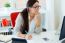 Young Businesswoman Working In Her Office With Laptop