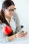 Young Businesswoman Working In Her Office With Mobile Phone