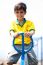 Young Kid Enjoying Swing Ride