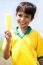 Smiling Kid Holding An Ice-cream