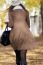 Portrait Of Beautiful Girl Walking In Autumn