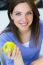 Young Woman Eating Green Apple