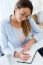 Pretty Young Woman Working In Her Office