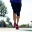 Runner Feet Running On Road Closeup On Shoe