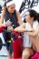 Women Relaxing In The Gym After Making Exercise