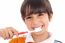 Closeup Of Cute Kid Brushing His Teeth