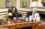 Pretty Woman Posing At Reception Desk