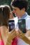 Couple Taking Photo Of Themselves With Smart Phone On Romantic P