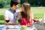 Attractive Couple On Romantic Picnic In Countryside