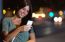 Beautiful Woman Use Her Phone In The City At Night