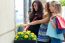 Group Of Beautiful Girls Looking At The Shop Window