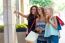 Group Of Beautiful Girls Looking At The Shop Window