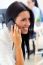 Young Pretty Business Woman With Mobile Phone In Her Office