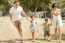 Family Running With Two Young Children