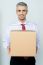 Businessman Holding Packed Carton