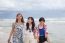 Portrait Of Young Asian Woman Friend Group Relaxing Cacation On Sea Beach With Smiling And Happiness Face