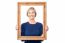 Woman Looking Through Wooden Frame