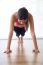 Beautiful Healthy Young Woman Doing Exercise At Home