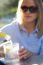 Beautiful Young Woman Drinking Soda In A Restaurant Terrace