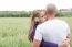 Loving Couple Standing In The Field