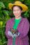 Female Agriculturist Hand Showing Mangosteens