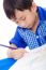 Adorable Boy Drawing Picture