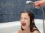 Mom Pours A Little Girl Out Of The Shower