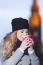 Attractive Young Stylish Blonde Girl Drinks Hot Drink From A Mug