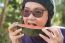 Close Up Face Of Young Woman Earting Water Melon