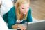 Pretty Young Woman Working With Laptop At Home