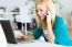 Pretty Young Woman Working With Laptop At Home