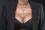 Woman With Big Breasts And Jewelry On Neck