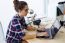 Young Businesswoman Working In Her Office With Laptop