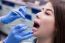 Young Woman At The Dental Office