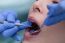 Young Woman At The Dental Office