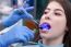 Young Woman At The Dental Office