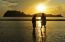 Girls And Boy On The Hat Sai Ri Beach During Sunrise