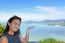 Women Tourist Inviting To See Of The Sea In Phuket Province, Tha