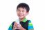 Close Up Boy Smiling And Holding Bottle Of Milk, On White