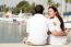 Couple Sitting At The Harbour