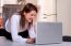 Woman In The Kitchen With Laptop