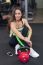 Happy Woman Having A Break From Exercising In Health Club