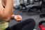 Happy Woman Having A Break From Exercising In Health Club