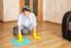 Woman Cleaning The Floor With A Rag