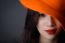 Portrait Of Beautiful Asian Woman Model In Orange Striped Hat Wi