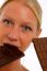 Woman Biting Chocolate