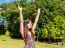 Girl Enjoing Sunny Skies In The Park