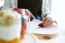 Beautiful Young Woman Preparing Breakfast At Home