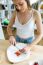 Beautiful Young Woman Preparing Breakfast At Home